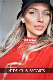 Tina escort - 34C bust, Blonde hair, Green eyes