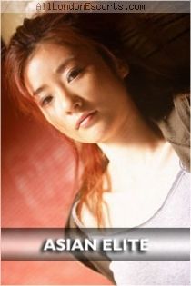 Naomi escort - 34D bust, red hair, Brown eyes