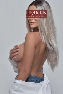Melanie escort - 36D bust, blonde hair, brown eyes