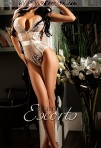Mariella escort - 34DD bust, brunette hair, brown eyes