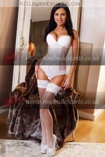 Cristine escort - 34C bust, brunette hair, brown eyes
