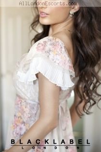 Karolina escort - 34D bust, Brunette hair, Green eyes