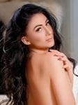 sensual European striptease girl in Kensington